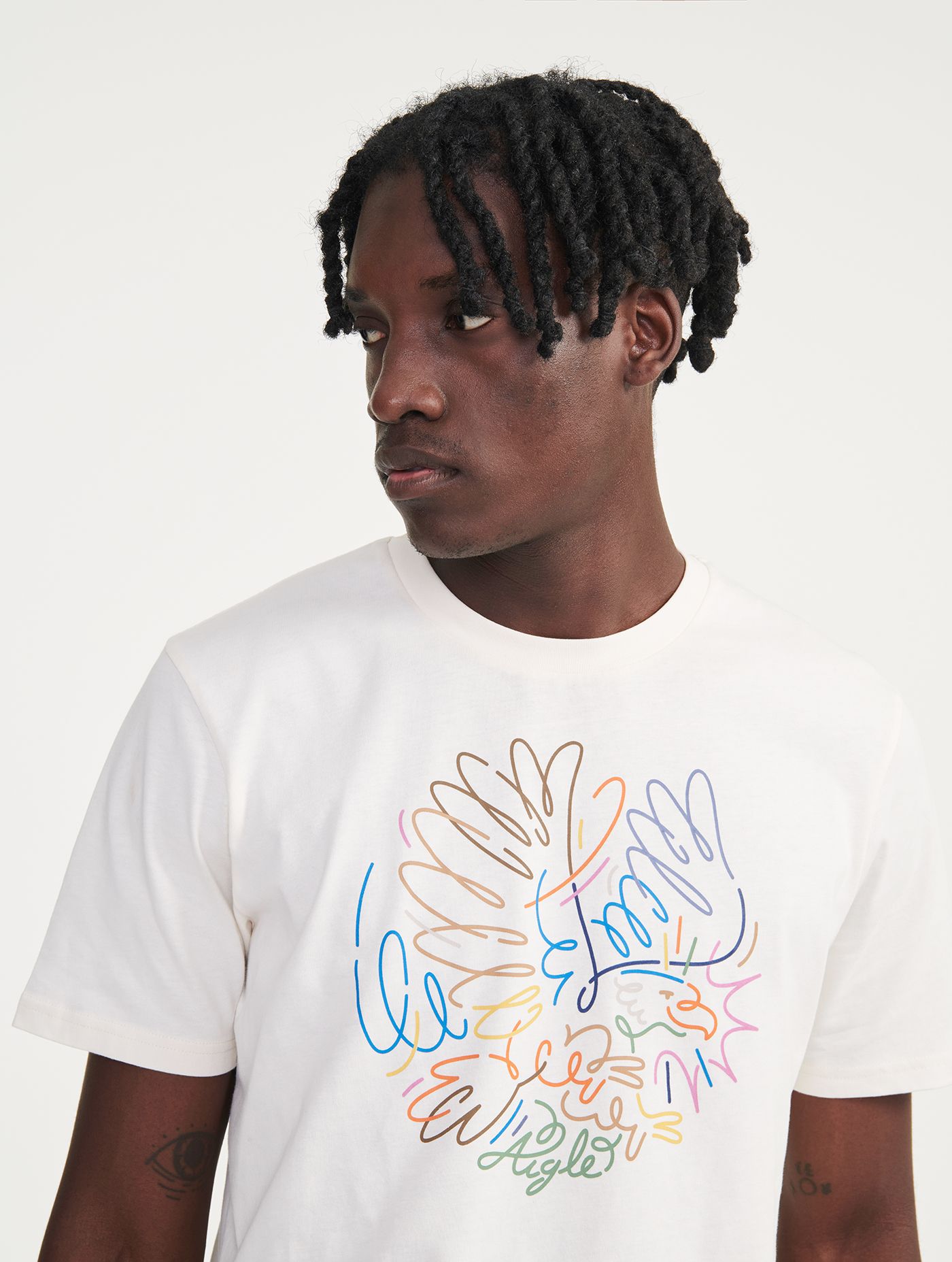 Pánské bavlněné tričko Aigle Jordy Artwork – krémově bílá (Lait / Off-White)